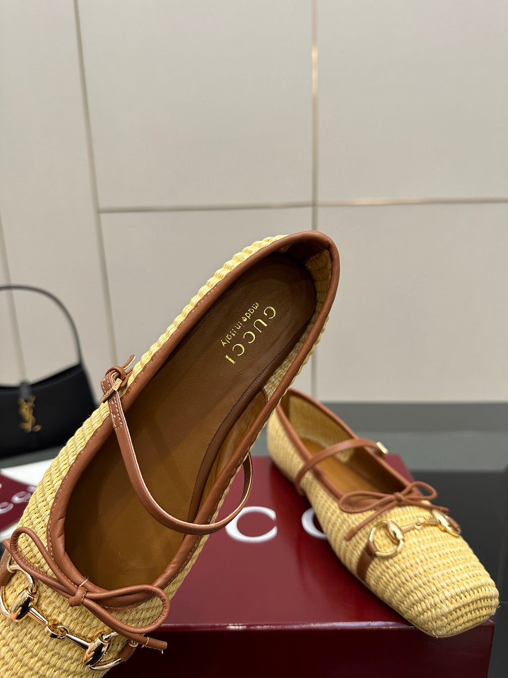 Gucci ladies woven loafer interior view with brown trim, showing insole