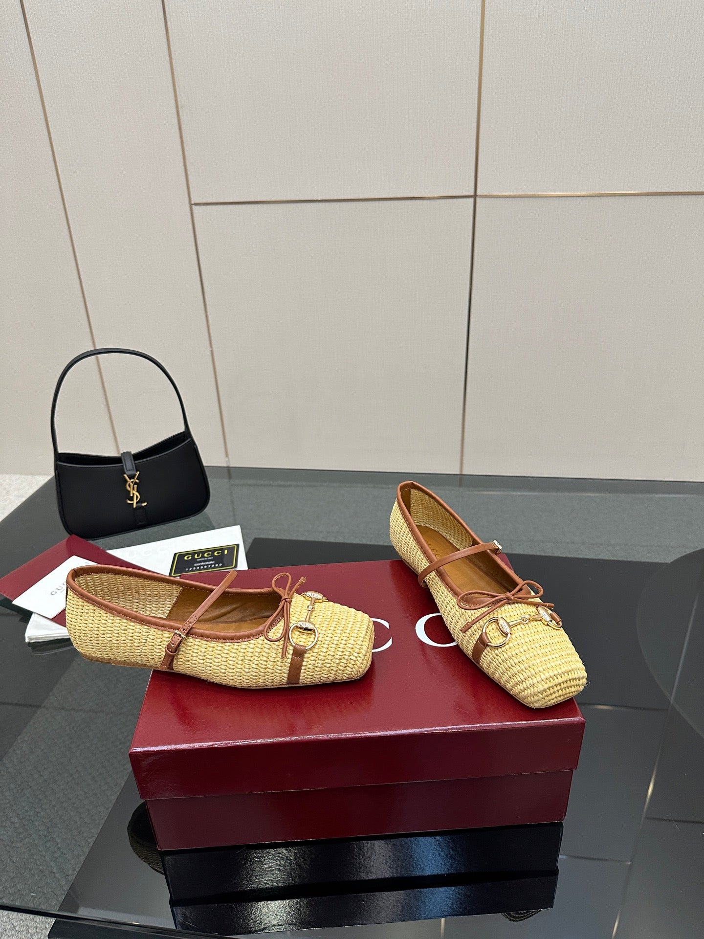 Gucci ladies woven loafers in yellow with brown trim, side view pair on box