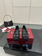 Gucci black flat loafers with Horsebit-style metal detail and patterned upper