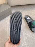 Black Balenciaga rubber outsole, ridged tread with logo, side view