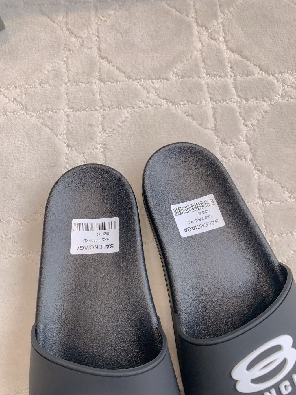 Balenciaga slide sandals, black, close-up of footbed with size label