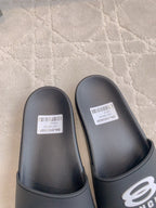 Balenciaga slide sandals, black, close-up of footbed with size label