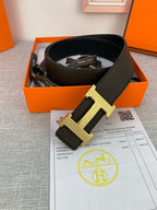 Dark leather belt with gold-tone H buckle in gift box