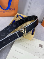 Black Louis-style monogram belt with gold buckle, shown with receipt and packaging