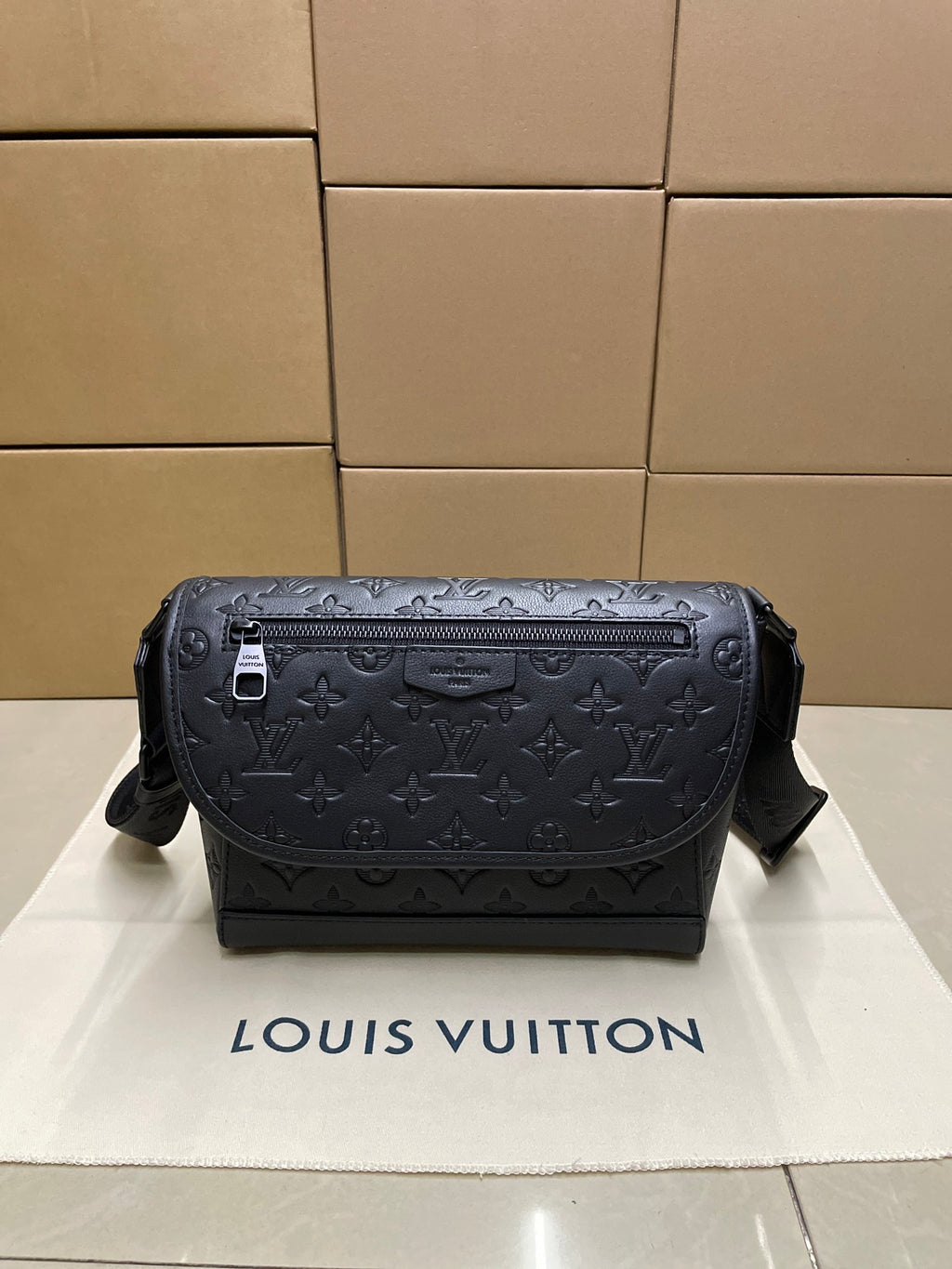Louis Vuitton dark monogram crossbody bag with top flap and black shoulder strap