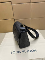 Louis Vuitton dark monogram crossbody bag with side profile and top handle