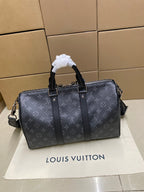 Louis Vuitton monogram duffel bag with top handle and shoulder strap, dark gray