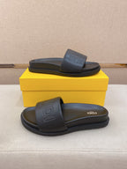 Fendi slide sandals in dark blue, top view with wide strap and logo