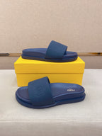 Fendi slide sandals, blue, front and side views with embossed FENDI logo