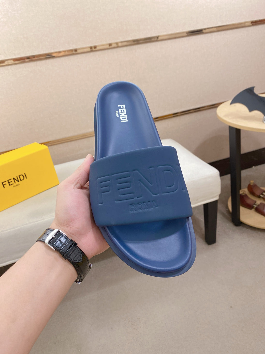 Fendi slide sandals, blue, with embossed FENDI logo on front strap and footbed