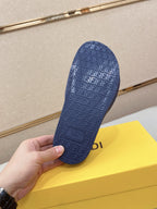 Fendi slide sandal outsole in blue with repeating FENDI logo pattern
