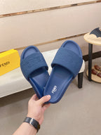 Fendi slide sandals, blue, pair with embossed FENDI logo on top straps