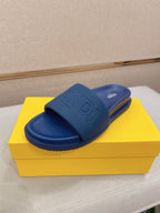 Fendi slide sandals in blue with wide embossed FENDI logo strap, open toe