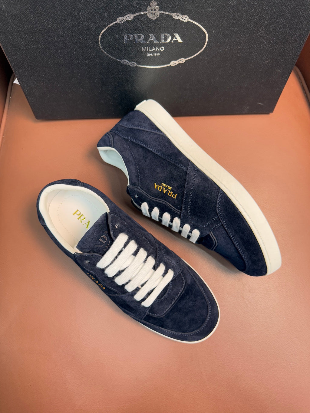Prada unisex sneakers, navy suede with white laces and side logo detail