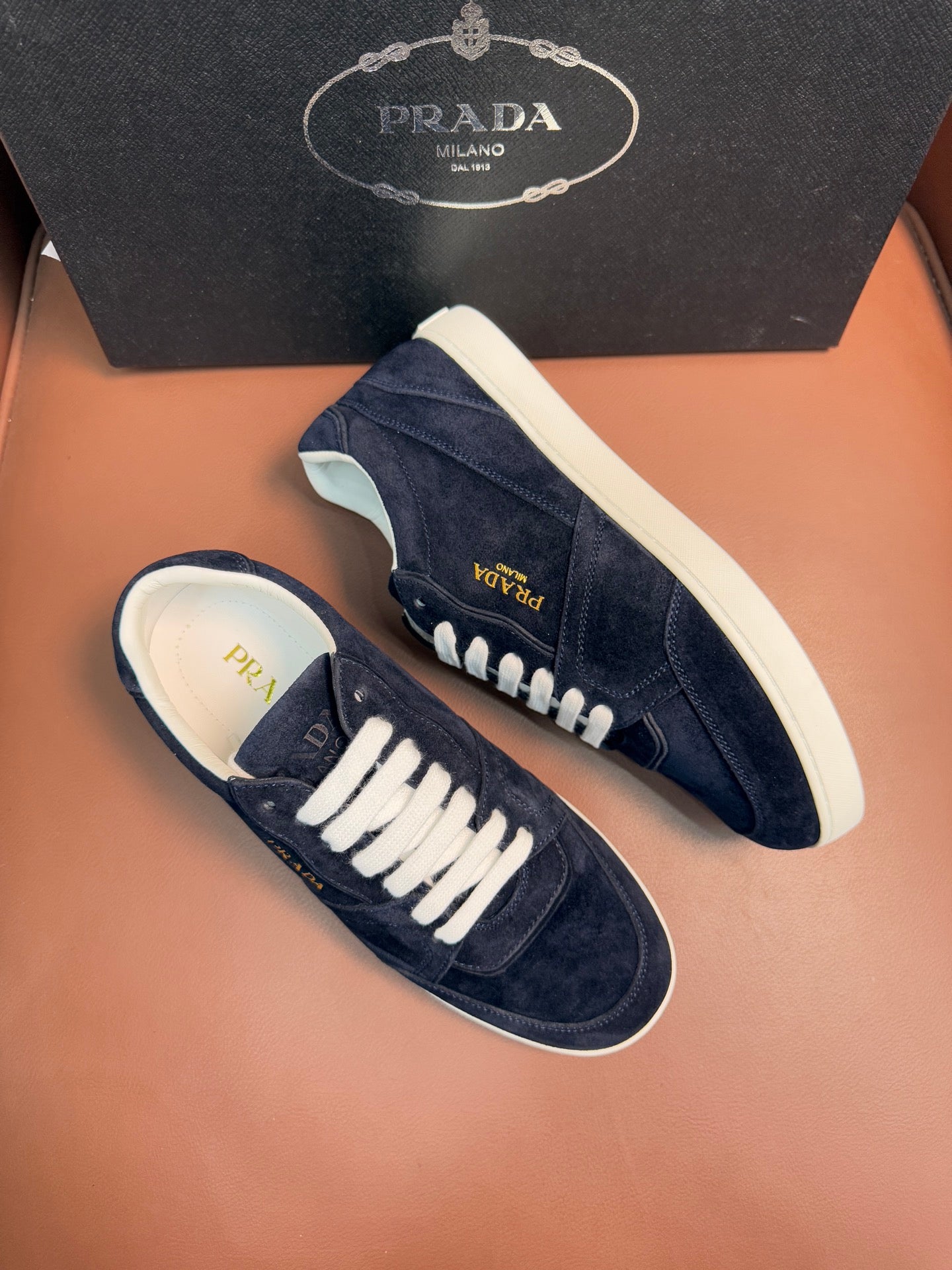 Prada unisex sneakers, navy suede with white laces and side logo detail