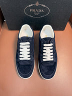 Prada unisex sneakers, dark navy suede with white laces and low-profile sole