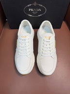 Prada unisex white sneakers, lace-up front with small triangle logo