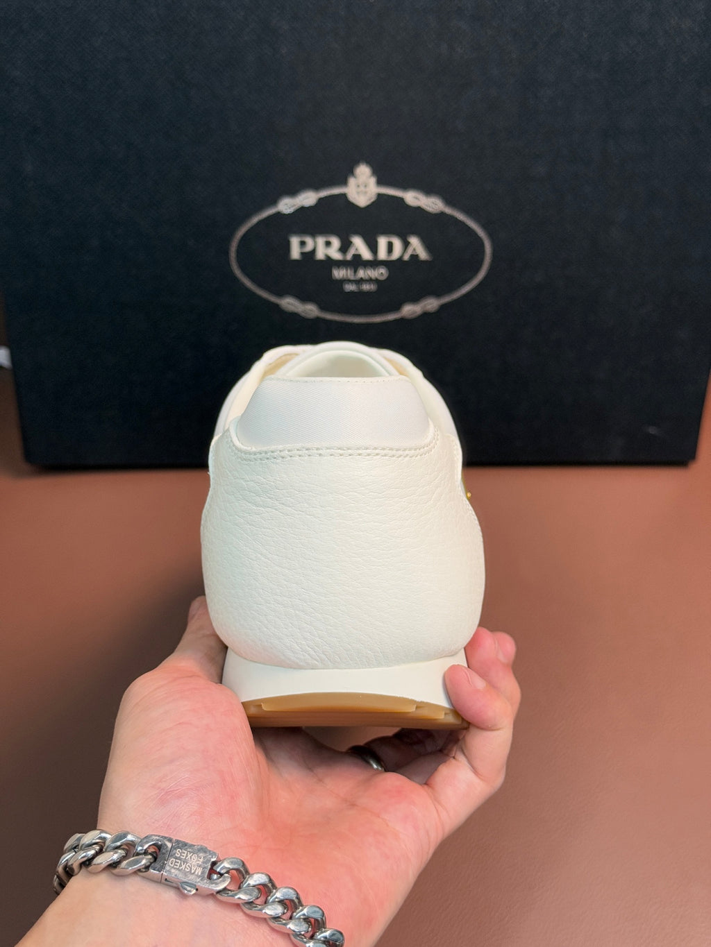 Prada unisex sneakers, white heel with back stitching and curved collar