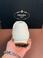 Prada unisex sneakers, white heel with back stitching and curved collar