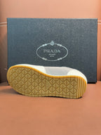 Prada unisex sneakers, underside view with gum rubber outsole tread