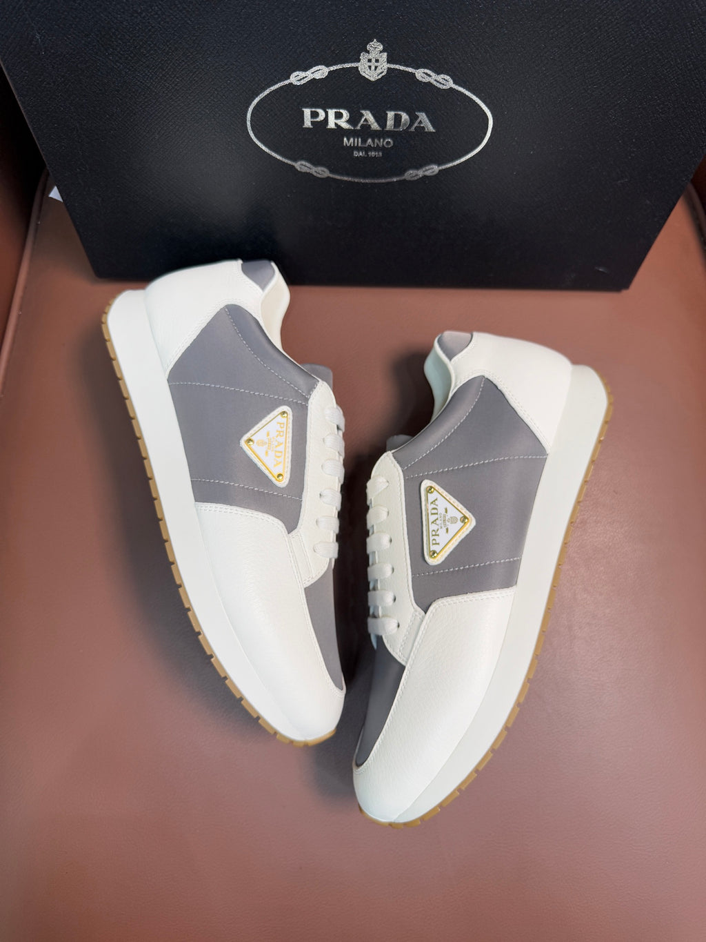Prada unisex platform sneakers, white with gray quarter panels and gum-trim sole