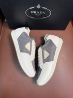 Prada unisex platform sneakers, white with gray quarter panels and gum-trim sole