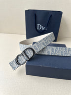 Dior logo belt with blue patterned strap and oval silver buckle