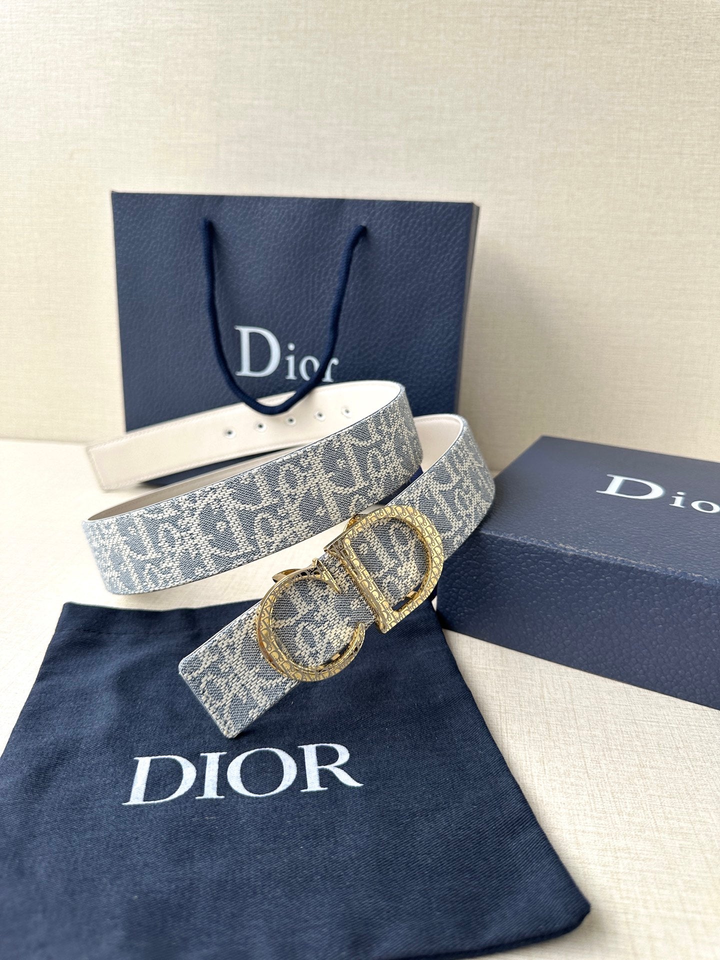 Dior logo belt with blue patterned strap and gold-tone buckle