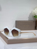 Sunglasses, white oversized square frames with brown tinted lenses and gold temples