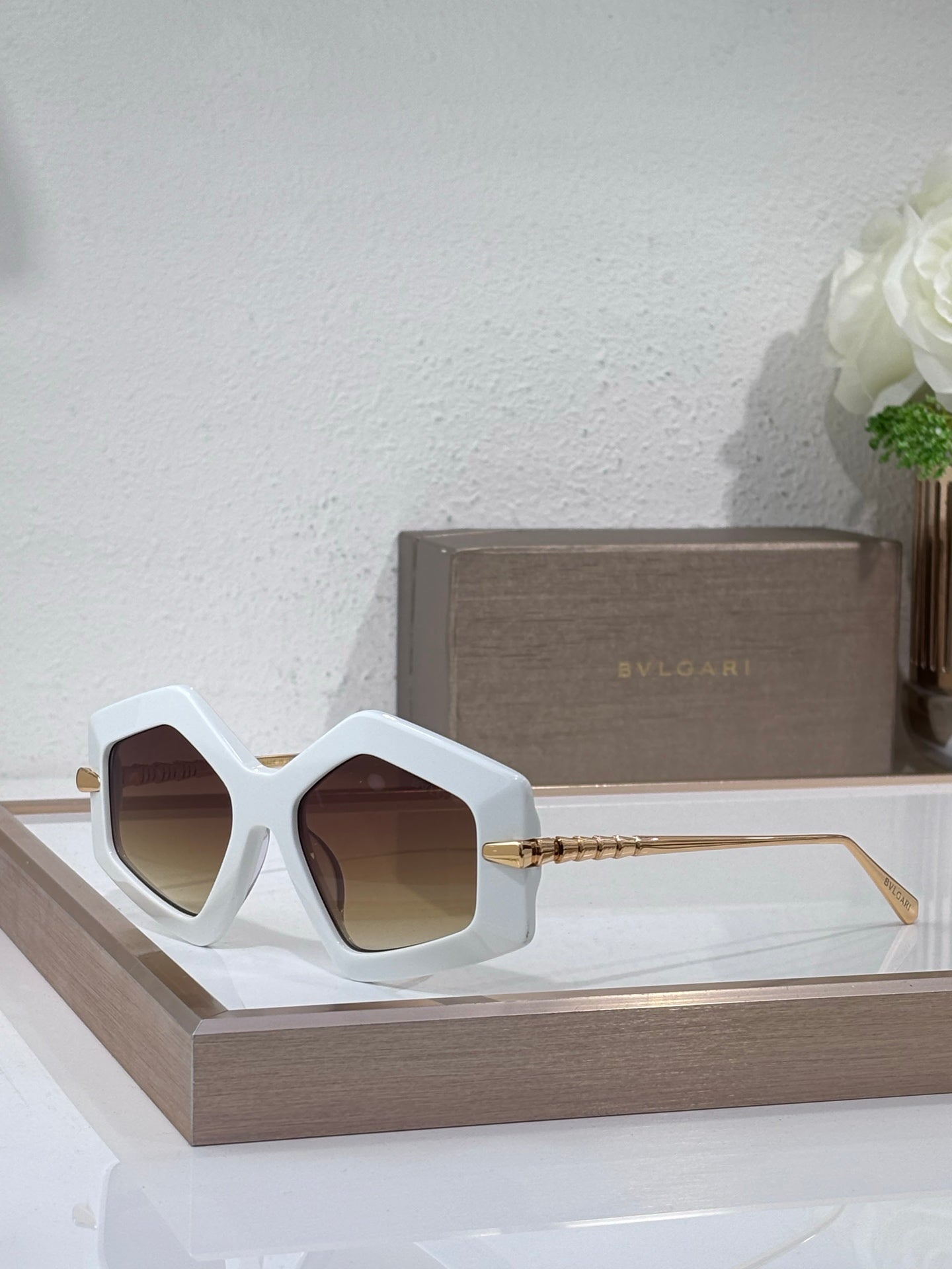 Sunglasses, white oversized square frames with brown tinted lenses and gold temples