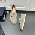 Prada unisex suede loafers in light gray, slip-on style with strap and stitched trim