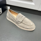Prada unisex suede loafer in light gray, slip-on design with strap detail and seams