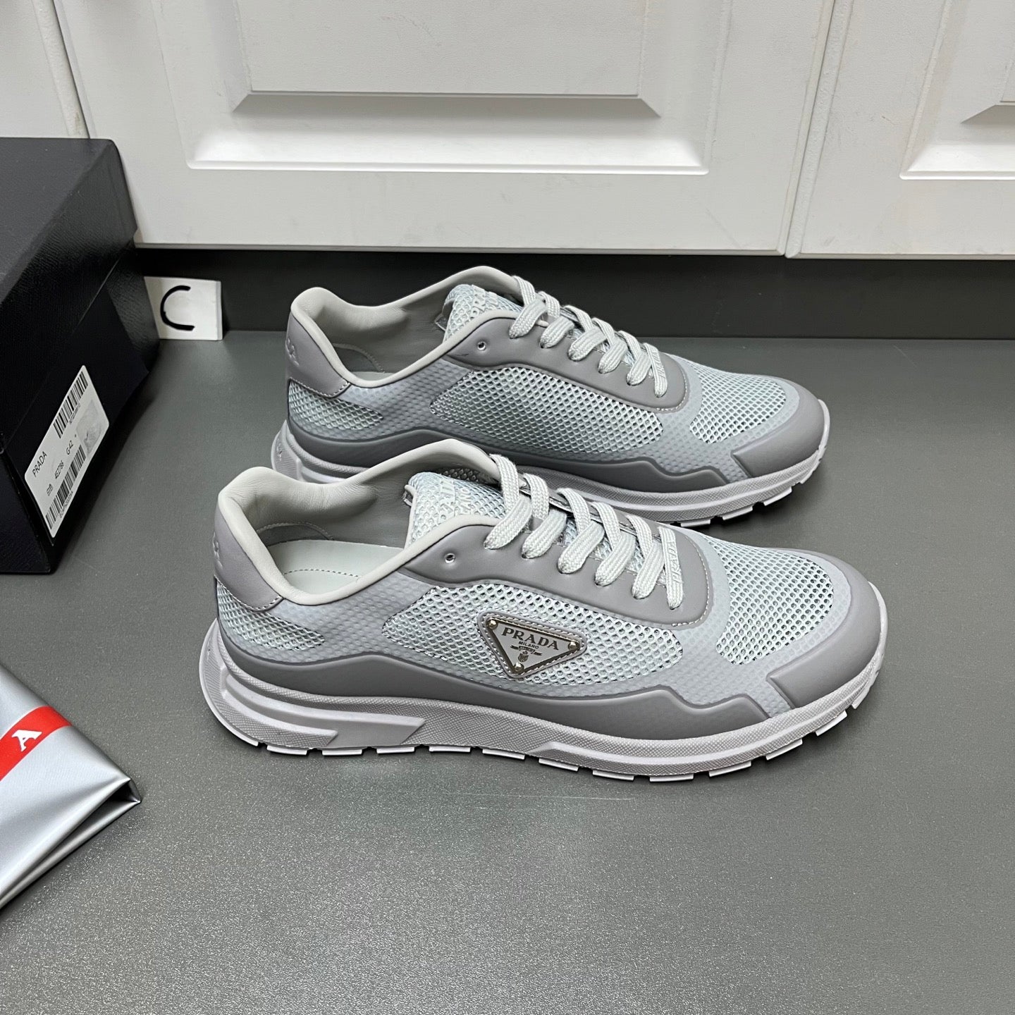 Prada unisex sneakers set, light gray mesh uppers with gray trim and lace-up