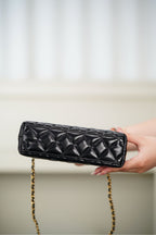 Black Chanel quilted mini bag wallet with gold chain strap