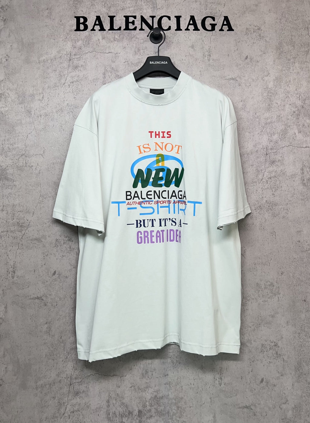Balenciaga white T-shirt with front graphic text and multicolor logo print