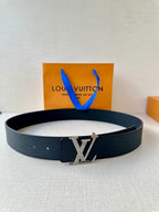 Louis Vuitton belt in dark blue with silver-toned LV buckle