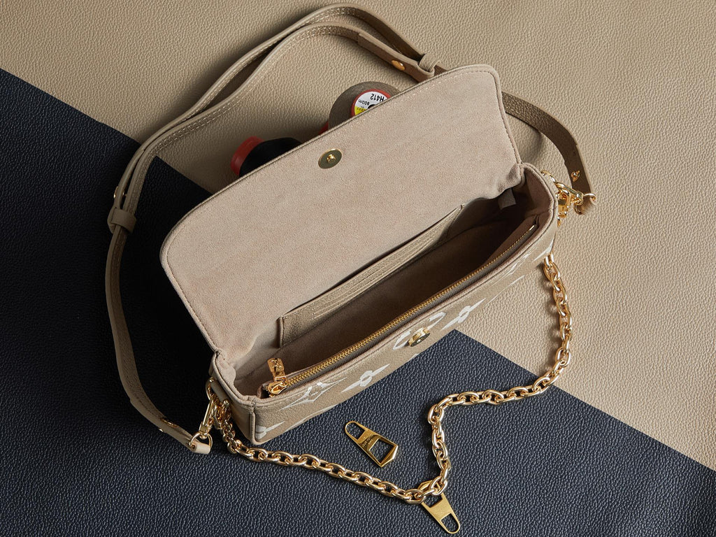 Louis Vuitton beige monogram crossbody bag interior with chain strap and open flap