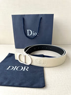 Dior belt with cream leather strap and logo buckle, dark underside visible
