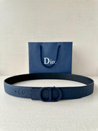 Blue leather Dior belt with embossed logo pattern and round CD buckle