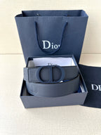 Blue leather Dior belt with CD clasp in gift box, folded strap ends visible