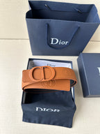Tan leather Dior belt with CD buckle and embossed logo on the strap