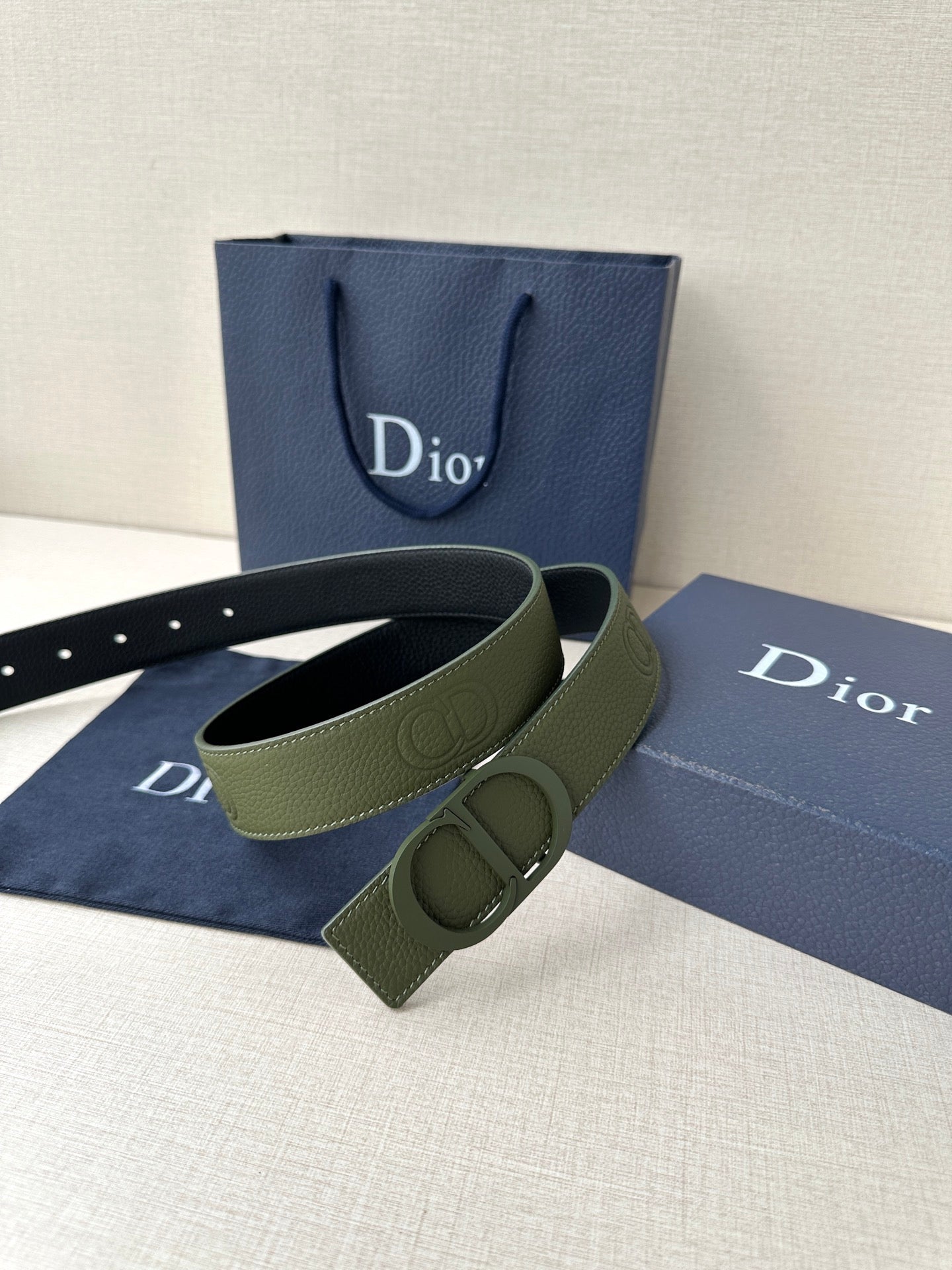 Dior belt with olive green leather strap and rectangular keeper, silver-toned buckle