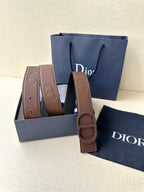 Dior brown leather belt with embossed buckle and coiled strap in gift box