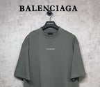 Balenciaga short-sleeve T-shirt with centered chest BALENCIAGA logo, dark gray-green.