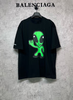 Balenciaga short-sleeve T-shirt, black with neon green alien graphic on front