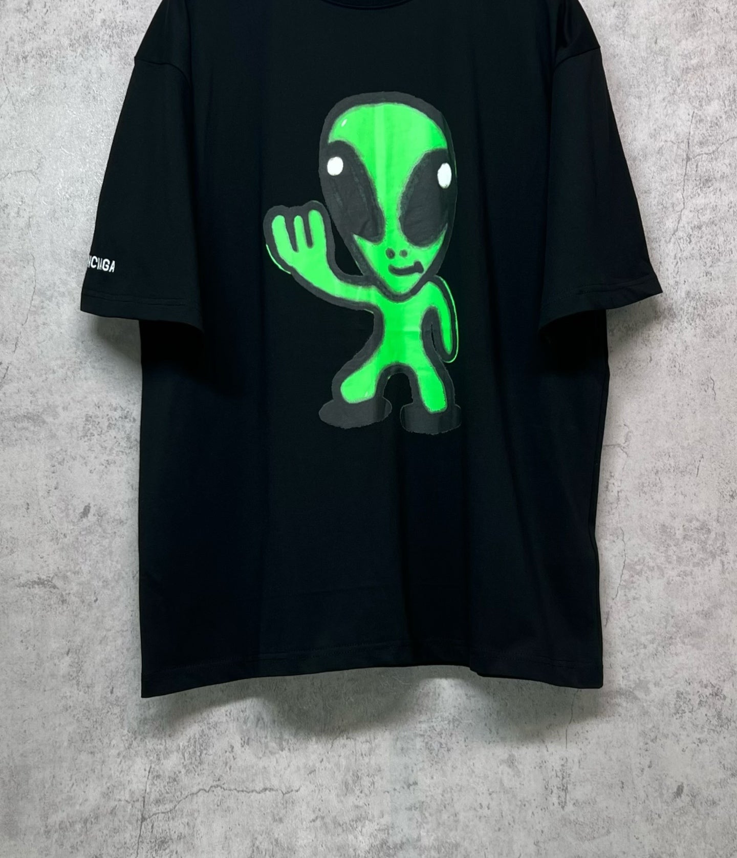 Balenciaga short-sleeve T-shirt, black with neon green alien character graphic front