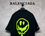Balenciaga short-sleeve T-shirt, black with neon green alien skull graphic on back