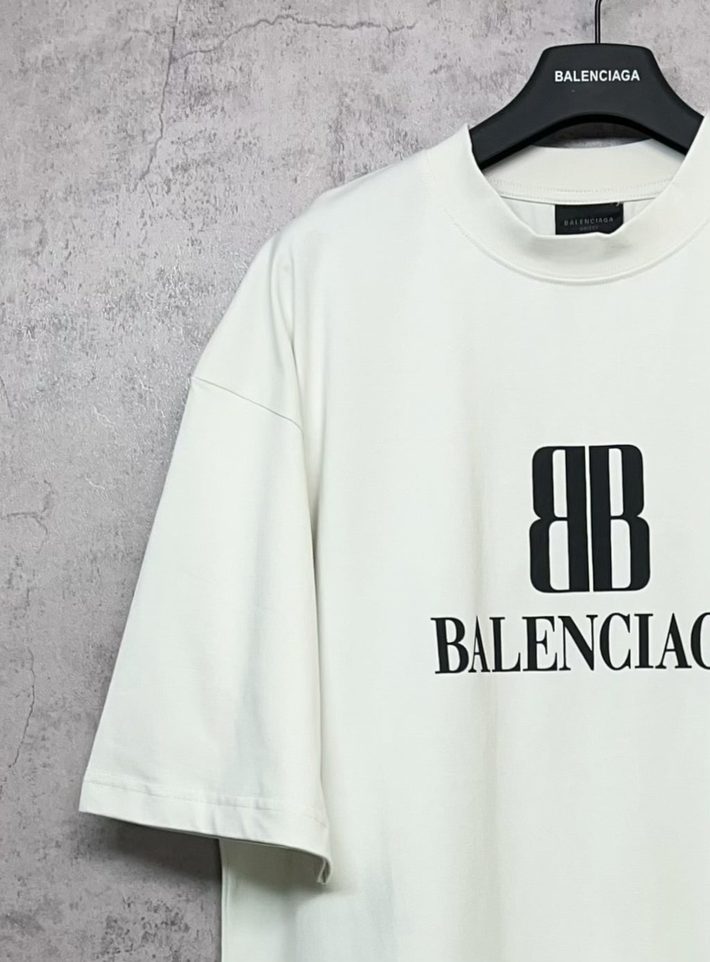 White Balenciaga logo T-shirt, angled front view, short sleeves, crew neck
