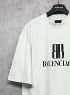 White Balenciaga logo T-shirt, angled front view, short sleeves, crew neck