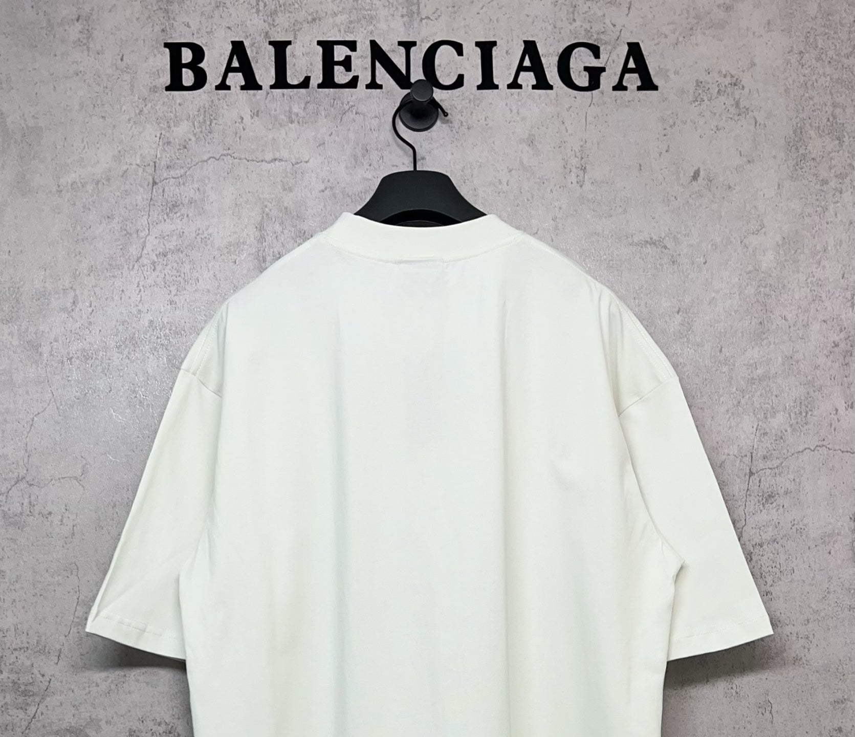 White Balenciaga logo T-shirt, back view with crew neck and short sleeves
